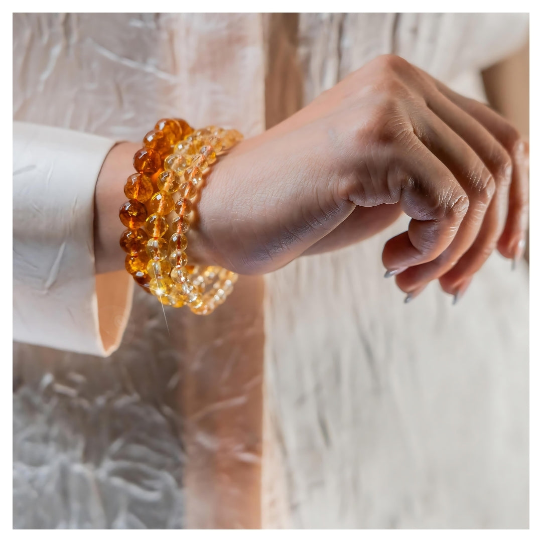 latatva citrine gemstone beaded bracelets stacked on a woman's wrist