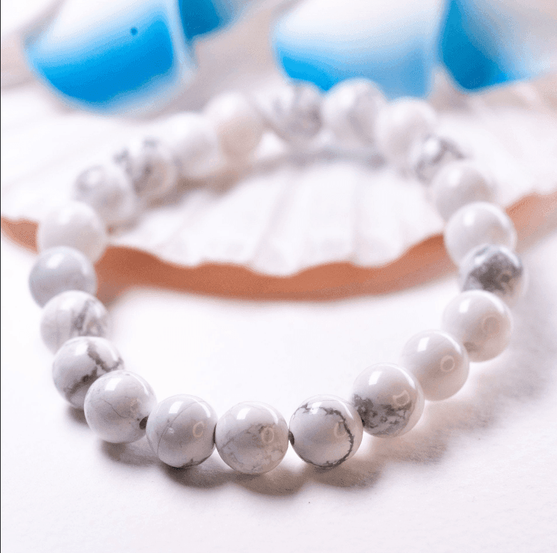 latatva white howlite gemstone beaded bracelet on shell background