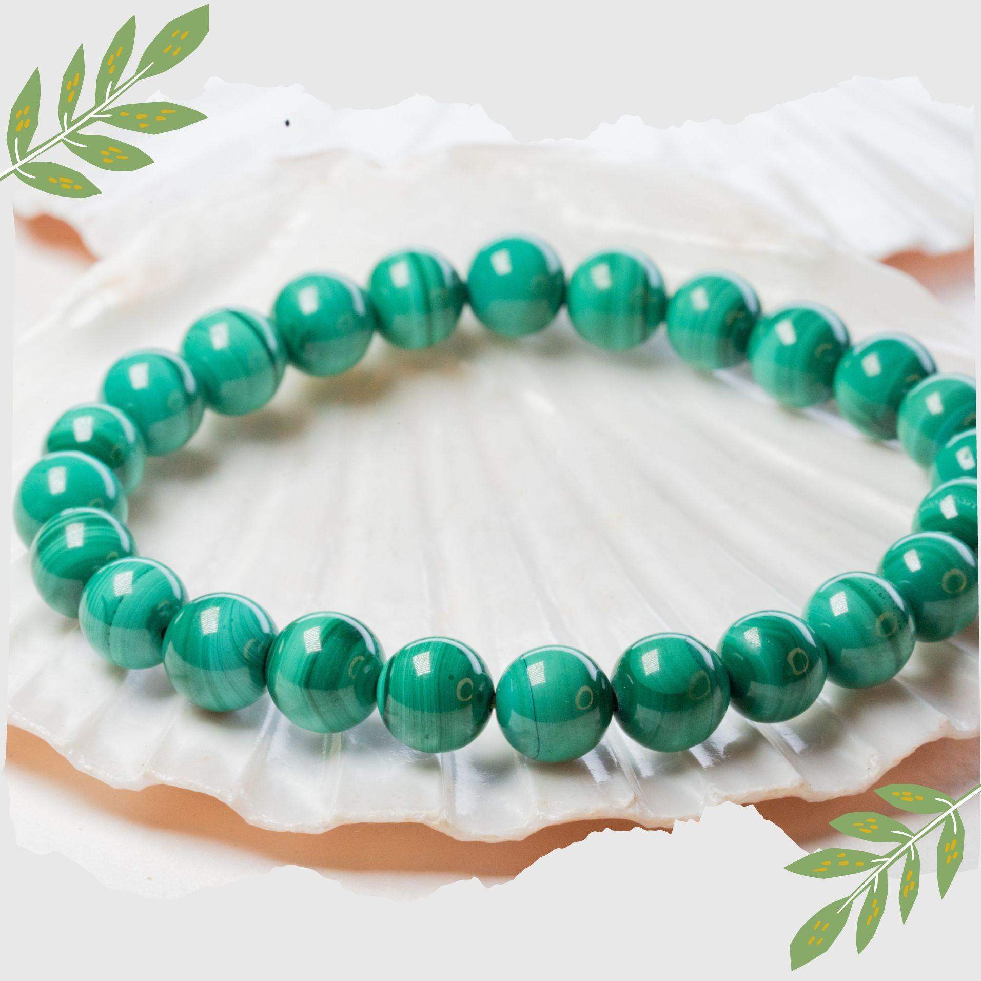 latatva malachite beaded bracelet with green gemstones displayed on a white seashell