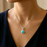 Elegant Turquoise Silver Pendant – Wear Calm. Carry Protection.