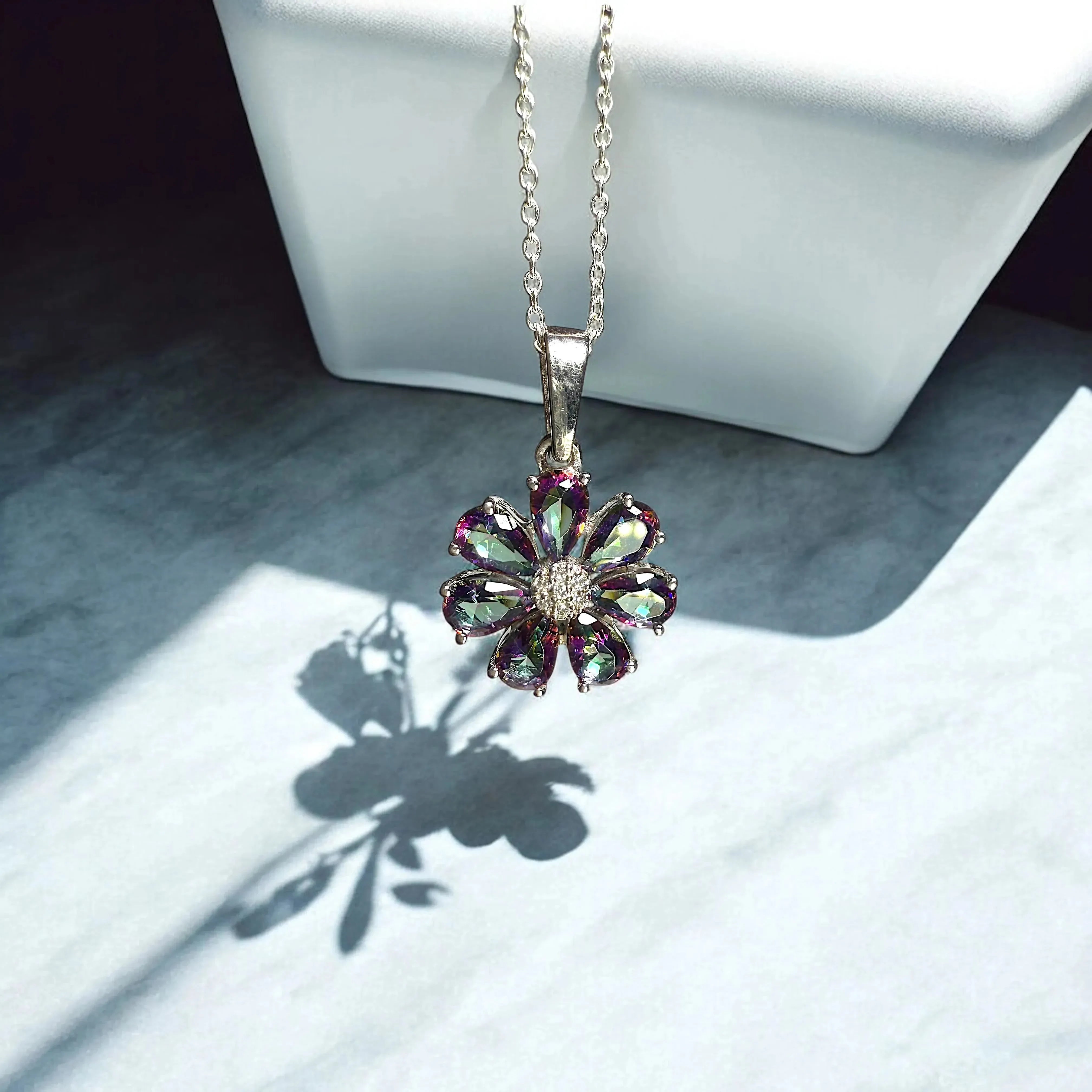 Enchanting Blossom: Mystic Quartz Flower Pendant